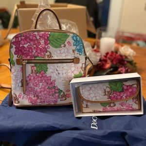 Dooney and bourke backpack with matching wallet